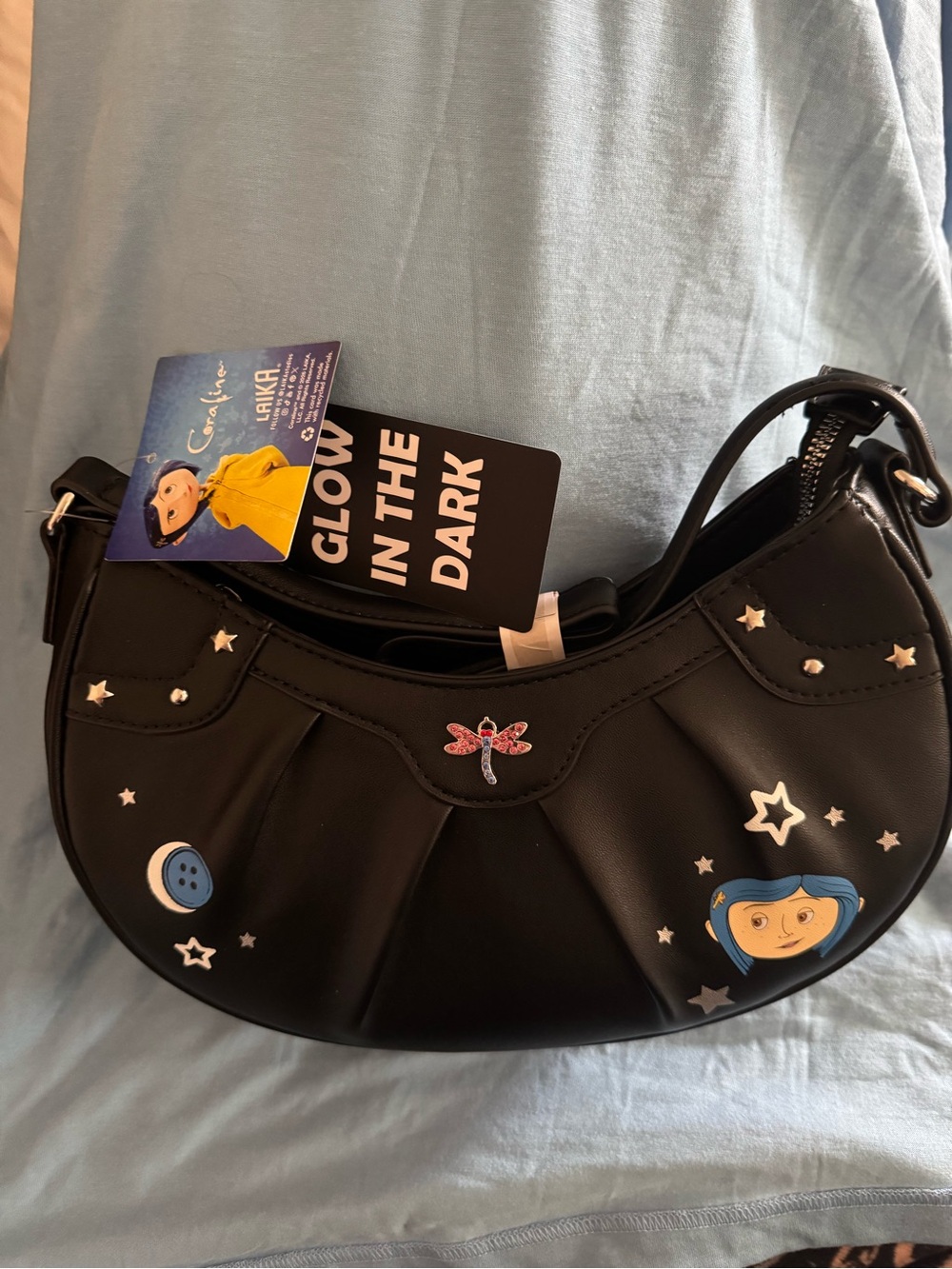 Hot Topic Coraline Crescent Shoulder Bag with Glow-In-The-Dark Accents